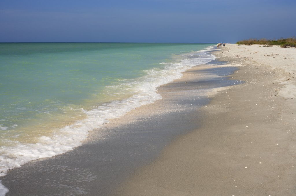 Beautiful beach on Sanibel Island, Florida.  The Gulf Coast beach is famous for sea shell collecting.